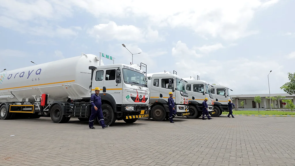 Oraya LNG fleet with crew walking past